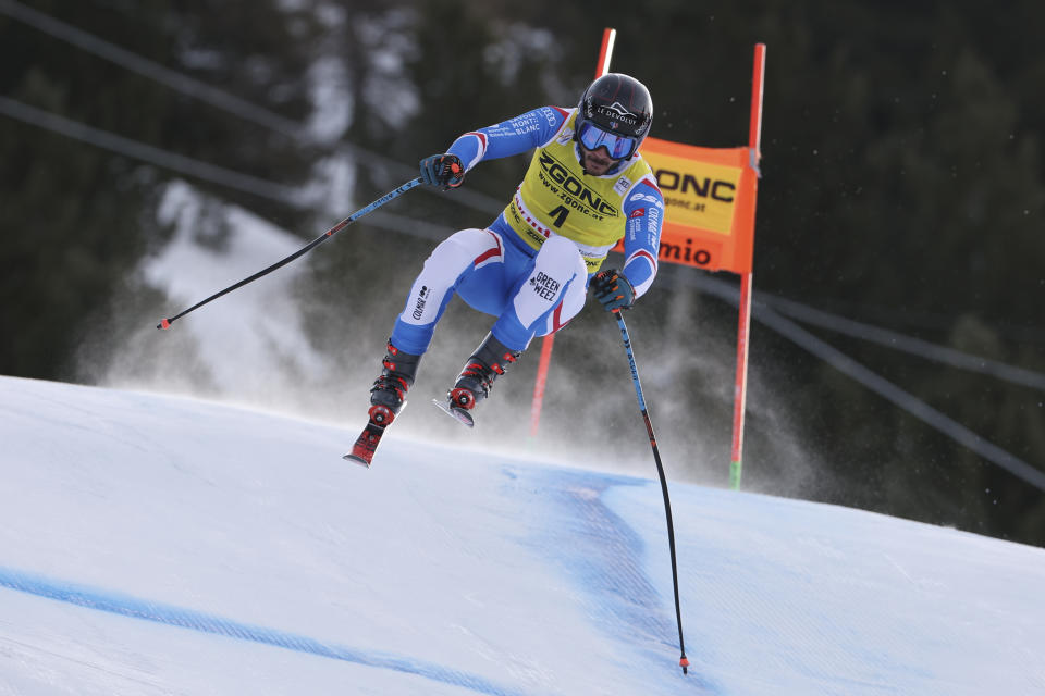 France's Cyprien Sarrazin speeds down the course during an alpine ski, men's World Cup downhill race, in Bormio, Italy, Thursday, Dec. 28, 2023. (AP Photo/Marco Trovati)