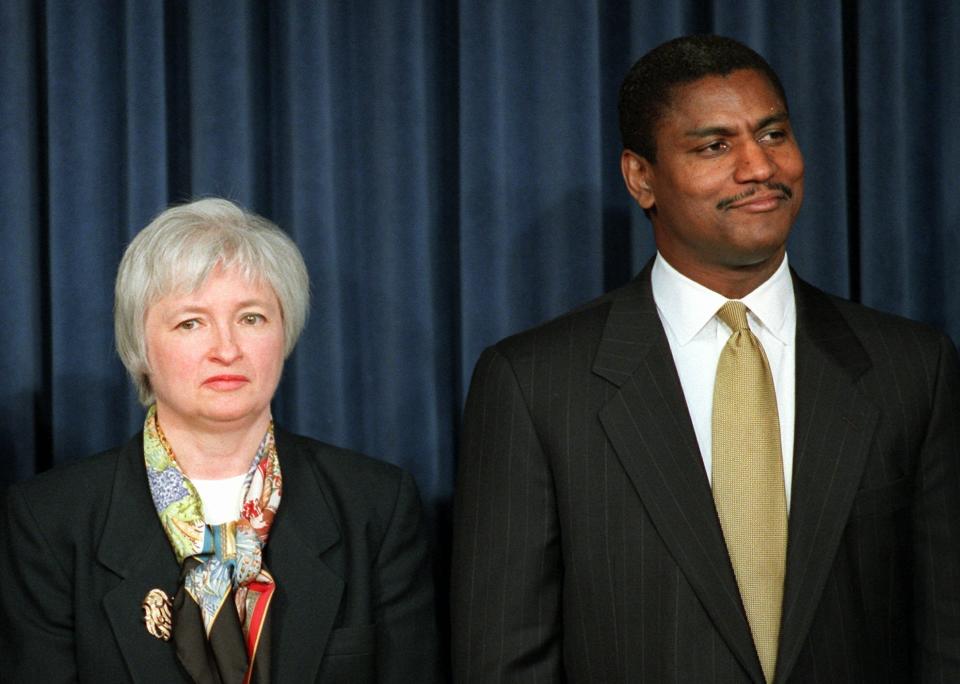 FILE - New members of the Clinton administration, Janet Yellen, Council of Economic Advisers, and Transportation Secretary-designate Rodney Slater, look on as President Bill Clinton announces their appointment in Washington, Dec. 20, 1996. (AP Photo/Joe Marquette, File)