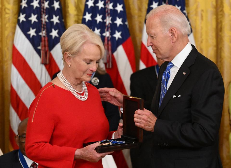 Biden presents Cindy McCain, the widow of former Senator and presidential candidate John McCain, posthumously with the Presidential Medal of Freedom. (SAUL LOEB / AFP via Getty Images)
