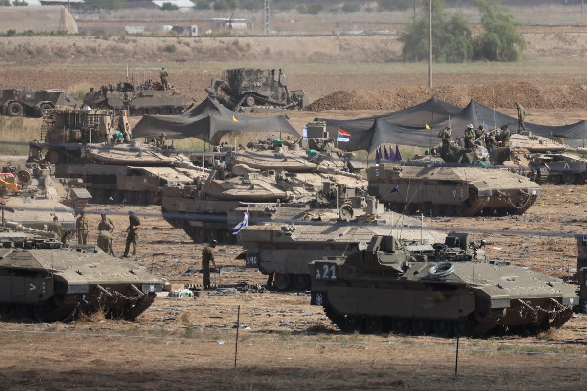Israeli soldiers preparing the scenario of a ground maneuvre near the Gaza border (EPA)