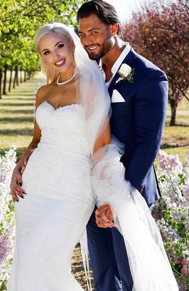 Married At First Sight contestants Lizzie Sobinoff and Sam Ball on their wedding day in season six