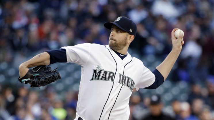 Seattle Mariners starting pitcher James Paxton throws against the Texas Rangers in the third inning of a baseball game Saturday, April 15, 2017, in Seattle. (AP Photo/Elaine Thompson)