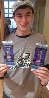 A January 2018 photo shows Cole Fitzgerald of Washington Township with tickets to attend Super Bowl LII in Minneapolis.
