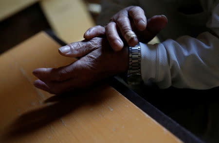 A 75-year-old man, who goes by the name Saburo Kita in Japanese media to avoid questions from his late wife's family, speaks during an interview with Reuters at his flat in Tokyo, Japan, April 22, 2018. REUTERS/Toru Hanai