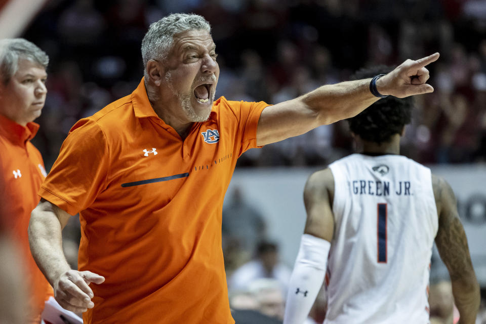 Auburn coach Bruce Pearl gives the team instruction during the first half of an NCAA college basketball game against Alabama, Wednesday, March 1, 2023, in Tuscaloosa, Ala. (AP Photo/Vasha Hunt)