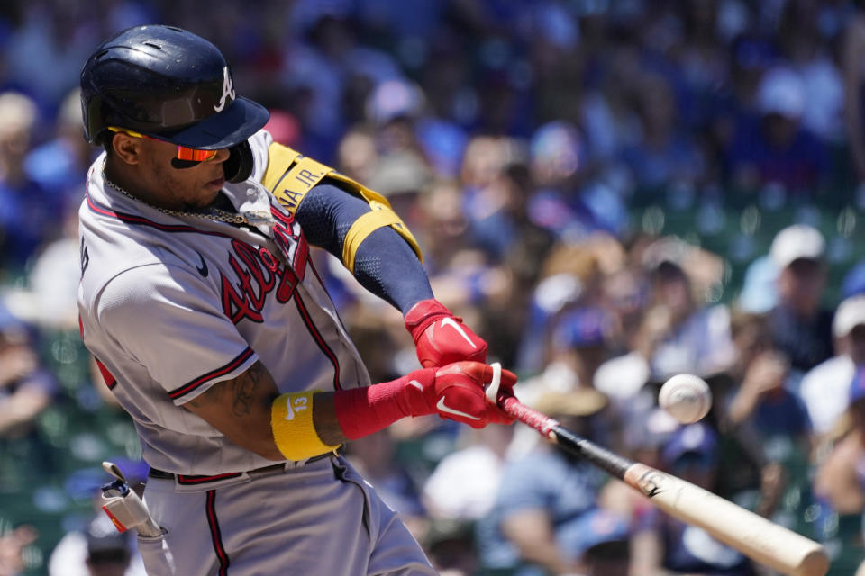 Atlanta Braves' Ronald Acuna Jr., hits a single against the Chicago Cubs during the first inning of a baseball game in Chicago, Friday, June 17, 2022. (AP Photo/Nam Y. Huh)