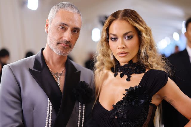 <p>Matt Winkelmeyer/MG23/Getty Images for The Met Museum/Vogue</p> Taika Waititi and Rita Ora attend the 2023 Met Gala