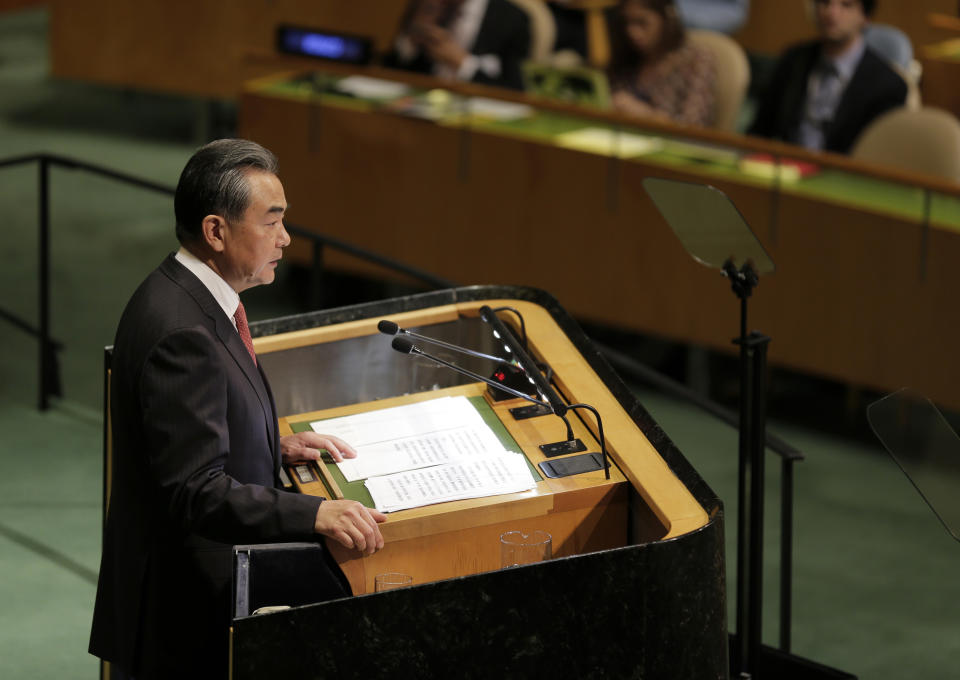 China's Foreign Minister Wang Yi addresses the 73rd session of the United Nations General Assembly, at U.N. headquarters, Friday, Sept. 28, 2018. (AP Photo/Seth Wenig)