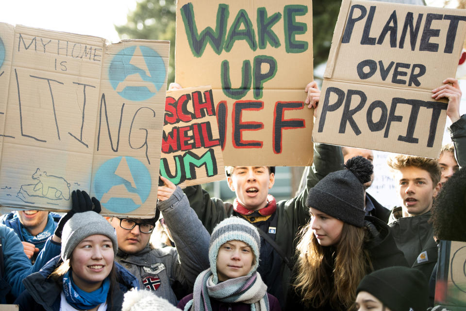 File---File photo taken Jan.24, 2020 shows Swedish climate activist Greta Thunberg, center, is pictured during a "Fridays for Future" demo on the final day of the 50th annual meeting of the World Economic Forum, WEF, in Davos, Switzerland. (Gian Ehrenzeller/Keystone via AP,file)