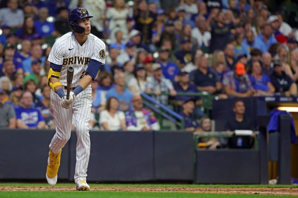 Brewers leftfielder Christian Yelich watches his three-run homer sail into the right-field stands during the seventh inning against the Cubs on Saturday night.
