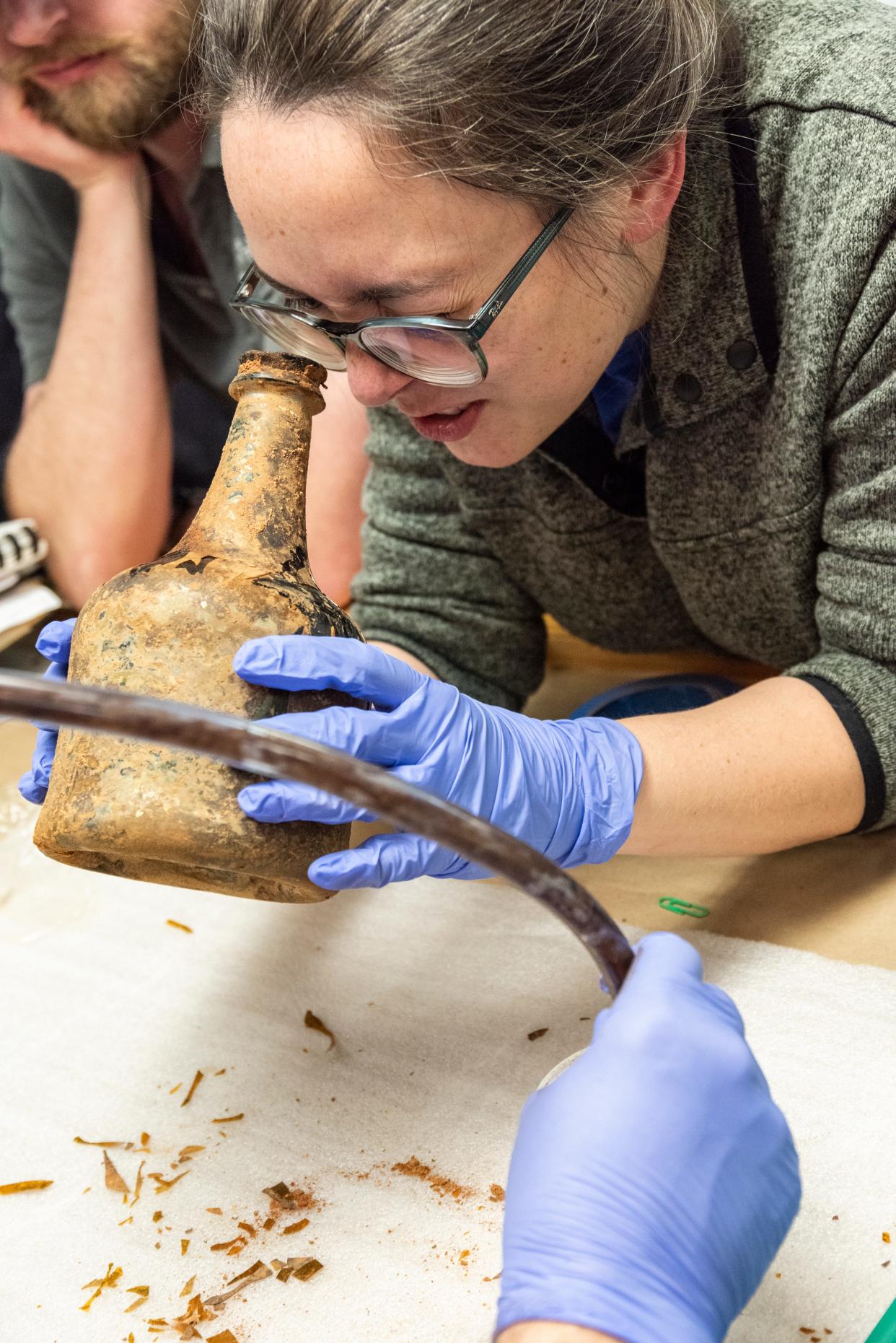 The glass jars were emptied to preserve the glass. They will be sent for conservation, and the liquid contents inside will be sent to a lab for analysis, states a press release from Mount Vernon.