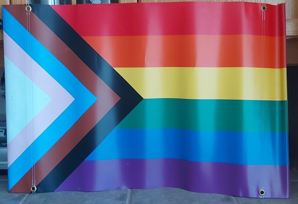 One of the Pride flag banners that will no longer be allowed to fly from Woodstock lampposts.