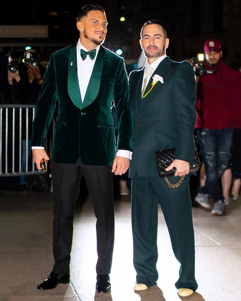 A gigantic fashion-world wedding demands two spectacular fits, as seen here on newlyweds Marc Jacobs and Char Defrancesco.