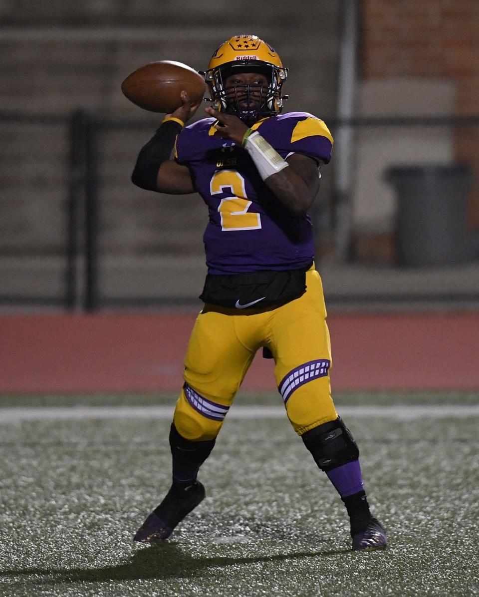 Nehemiah Azeem #2 of the OLSH Chargers drops back to pass in the first half during the game against the Cornell Raiders at Tiger Stadium on October 28, 2022 in Moon Township, Pennsylvania