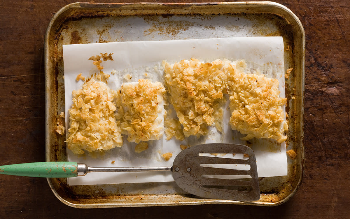 <p>Mark Boughton</p><p>Crushed kettle-cooked potato chips turn simple ﬁsh ﬁllets into crispy, crunchy deliciousness.</p><p><strong>Get the recipe: <a href="https://parade.com/842696/communitytable/potato-chip-fish/" rel="nofollow noopener" target="_blank" data-ylk="slk:Potato Chip Fish;elm:context_link;itc:0;sec:content-canvas" class="link rapid-noclick-resp"><em>Potato Chip Fish</em></a></strong></p>