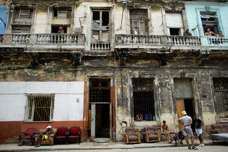 People put furniture out to dry outside their homes after Hurricane Irma caused flooding and a blackout, in Havana, Cuba September 11, 2017. REUTERS/Alexandre Meneghini