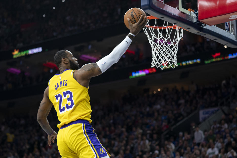 Los Angeles Lakers' LeBron James goes up for the shot during the first half of an NBA basketball game against the Philadelphia 76ers, Saturday, Jan. 25, 2020, in Philadelphia. (AP Photo/Chris Szagola)