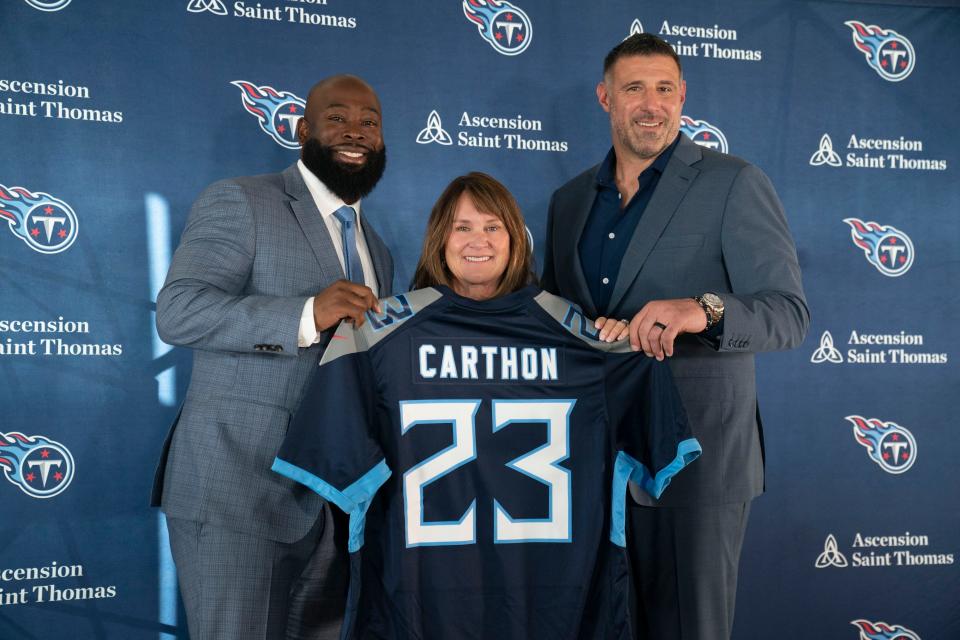 Tennessee Titans new general manager Ran Carthon, left, poses with controlling owner Amy Adams Strunk and head coach Mike Vrabel during a press conference announcing Carthon's hiring at Ascension Saint Thomas Sports Park on Jan. 20, 2023, in Nashville.