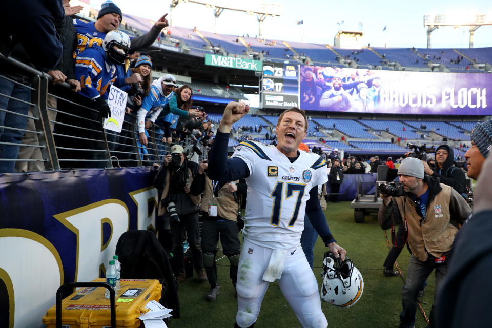 <p>Philip Rivers #17 of the Los Angeles Chargers celebrates after defeating the Baltimore Ravens after the AFC Wild Card Playoff game at M&T Bank Stadium on January 06, 2019 in Baltimore, Maryland. The Chargers defeated the Ravens with a score of 23 to 17. (Photo by Rob Carr/Getty Images) </p>