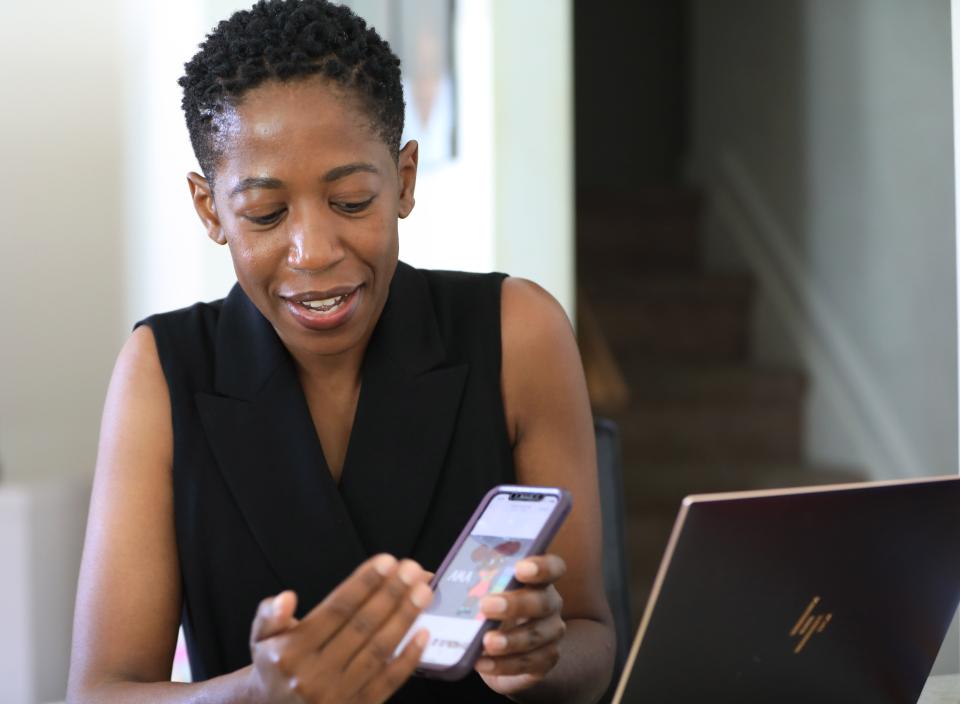 Rose Obare talks about one of her characters that she developed for her YouTube channel, TotoLand while at her home in Middletown on June 29, 2022. 