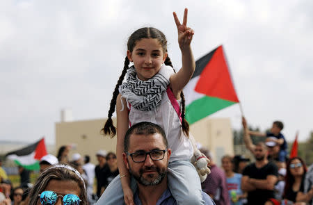 Israeli Arabs take part in a rally calling for the right of return for refugees who fled their homes during the 1948 Arab-Israeli War, near Atlit, Israel April 19, 2018. REUTERS/Ammar Awad