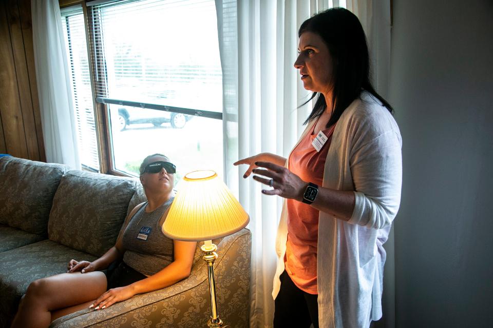 Elaine Eshbaugh, a professor of gerontology, speaks during a discussion at the University of Northern Iowa Dementia Simulation House on May 10 in Cedar Falls.