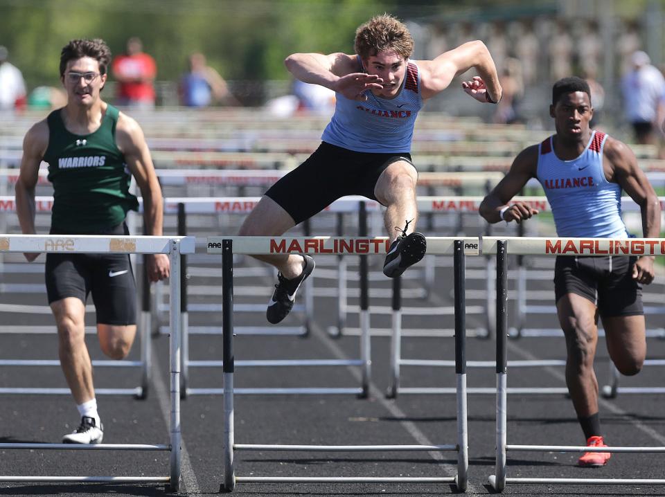 Alliance’s Brendan Zurbrugg runs to victory in the 110-meter high hurdles during the EBC Championships at Marlington High School, Saturday, May 14, 2022. Zurbrugg won four individual events Saturday.