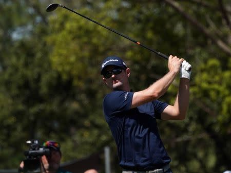 Mar 11, 2018; Palm Harbor, FL, USA; Justin Rose tees off on the 5th during the final round of the Valspar Championship golf tournament at Innisbrook Resort - Copperhead Course. Jasen Vinlove-USA TODAY Sports