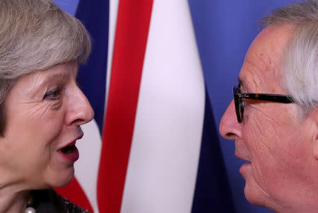 FILE PHOTO: British Prime Minister Theresa May meets with European Commission President Jean-Claude Juncker to discuss Brexit, at the EU headquarters in Brussels, Belgium December 11, 2018. REUTERS/Yves Herman/File Photo