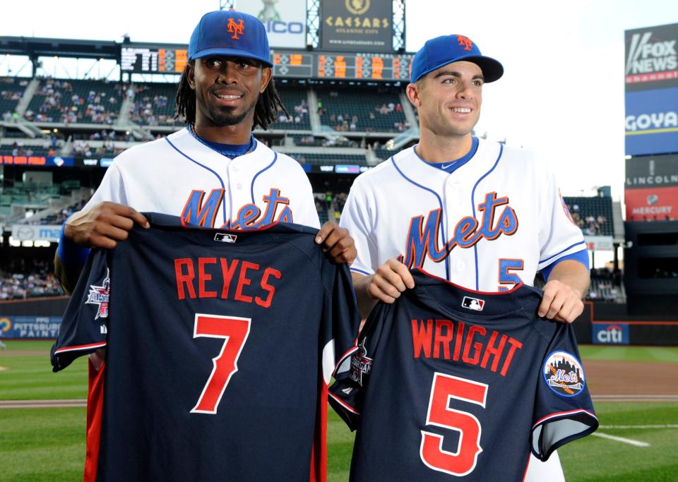 Mets Jose Reyes, left, and David Wright show off their All-Star jerseys before their baseball game against the Atlanta Braves at Citi Field in New York, Friday, July 9, 2010. Wright will be the starting third baseman and Reyes the backup shortstop.