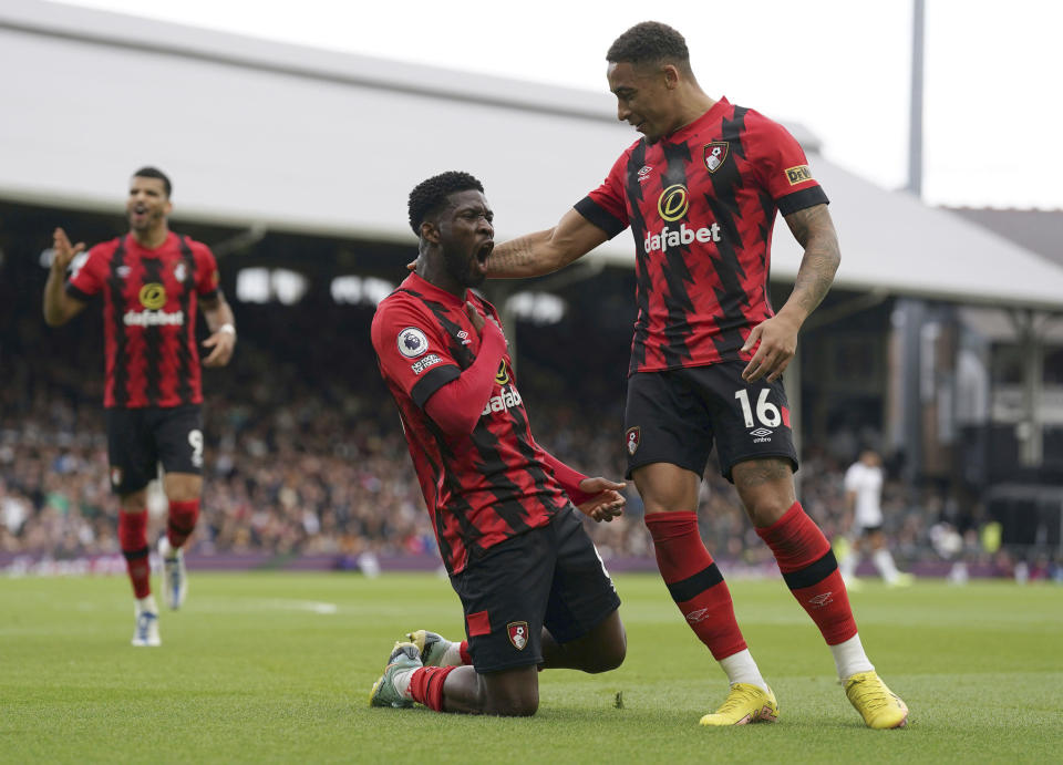 Bournemouth's Jefferson Lerma, centre, celebrates scoring his side's second goal, during the English Premier League soccer match between Fulham and Bournemouth, at Craven Cottage, London, Saturday, Oct, 15, 2022. (Adam Davy/PA via AP)