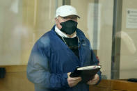 Michael Skakel arrives to a courthouse in Stamford, Conn., Friday, Oct. 30, 2020. Skakel, a Kennedy cousin, is expected at a court hearing as Connecticut prosecutors decide whether to retry him for the bludgeoning death of a fellow teenager in 1975. (AP Photo/Seth Wenig)