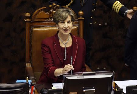 Senator for the Socialist Party Isabel Allende (C), daughter of Chile's late President Salvador Allende, takes her seat as president of the Senate as the new Congress holds its first session in Valparaiso, in this March 11, 2014 file photo. REUTERS/Eliseo Fernandez/Files