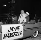 <p>You couldn't miss Jayne Mansfield as she and her daughter rode through the Christmas parade in Hollywood in 1958. </p>