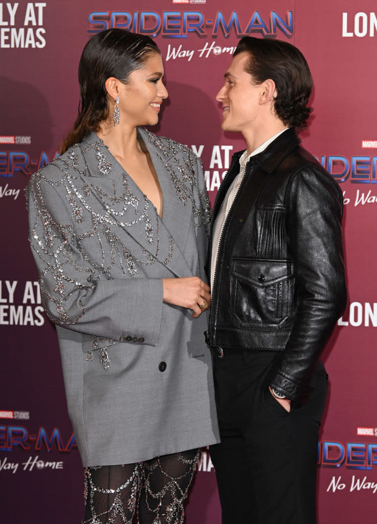 Zendaya and Tom Holland attend a photo-call for "Spider-Man: No Way Home"