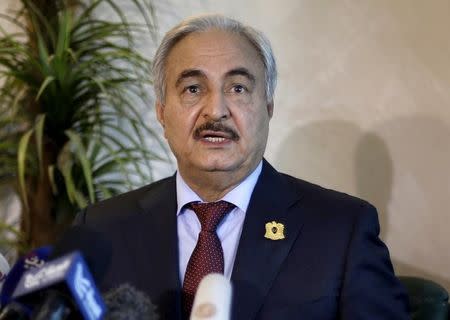 Libyan General Khalifa Haftar, chief of the army loyal to the internationally recognized government, speaks during a news conference in Amman, Jordan August 24, 2015. REUTERS/Muhammad Hamed/Files