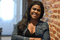 Savannah Daniels poses for a photo, Thursday, May 16, 2019, in Baltimore. Daniels, 32, a military veteran living in Baltimore says she realized she identified as female by watching episodes of "RuPaul's Drag Race" television series while serving in Afghanistan as a chaplain's assistant in the U.S. Navy. (AP Photo/Mike Stewart)