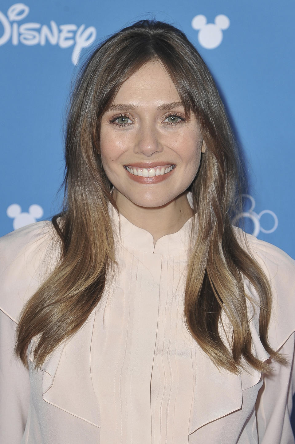 Elizabeth Olsen attends the Disney+ press line at the 2019 D23 Expo on Friday, Aug. 23, 2019, in Los Angeles. (Photo by Richard Shotwell/Invision/AP)