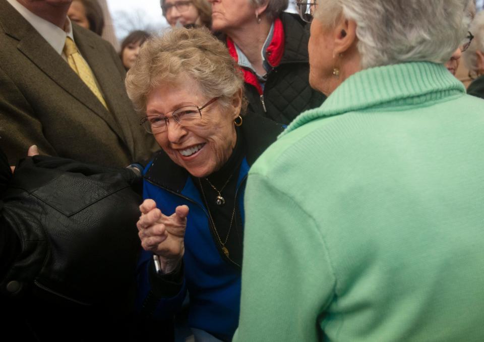 Alice "Cookie" Barron waves to an attendee during the Flying Queens Museum opening Saturday in Plainview. Barron was a Flying Queen from 1954 to 1957 and never played in a losing game while at Wayland.