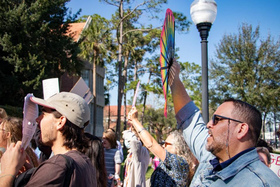 Antonio Lopez, 43, a UF faculty member, chants during the protest on Ben Sasse's first day as the University of Florida president. "I'm very worried about my rights as a member of the LGBTQ community," Lopez said. 