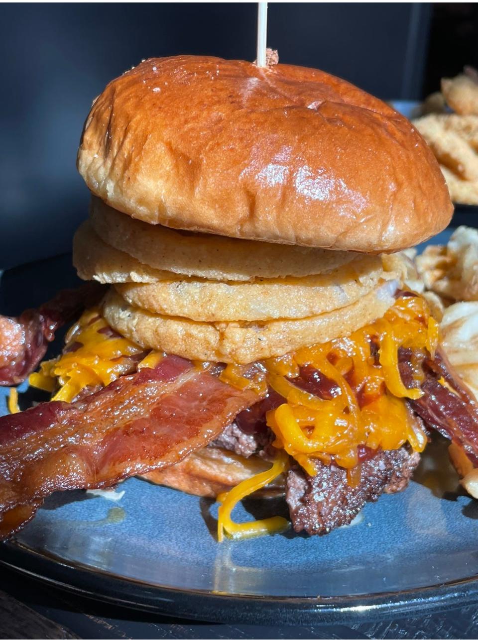 Walk-On's Sports Bistreaux  will have five hand-pattied burgers on the menu when it opens at 247 S. Meridian St., Indianapolis, on May 15, 2023.