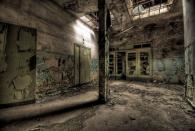 <p>Beams of light from above illuminate this old hospital basement - a place you surely wouldn't want to be a night.</p>