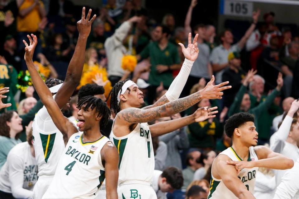 Baylor players celebrate after a teammate scored a three pointer during the first round game between Colgate University and Baylor University in the 2024 NCAA Tournament at FedExForum in Memphis, Tenn., on Friday, March 22, 2024.