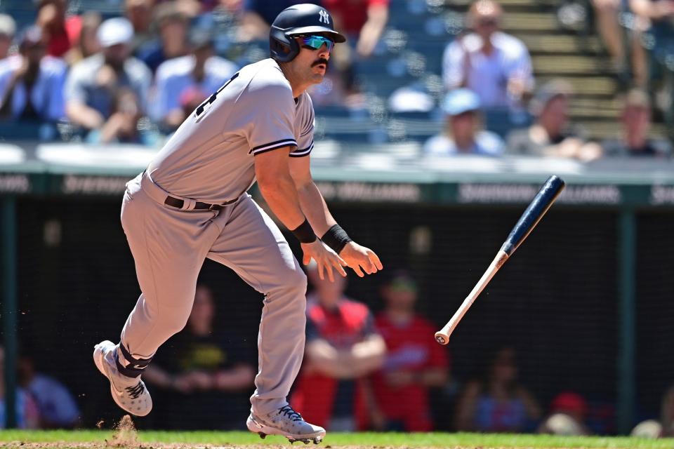 New York Yankees' Matt Carpenter watches the ball after hitting a RBI-single in the seventh inning in the first baseball game of a doubleheader against the Cleveland Guardians, Saturday, July 2, 2022, in Cleveland. (AP Photo/David Dermer)