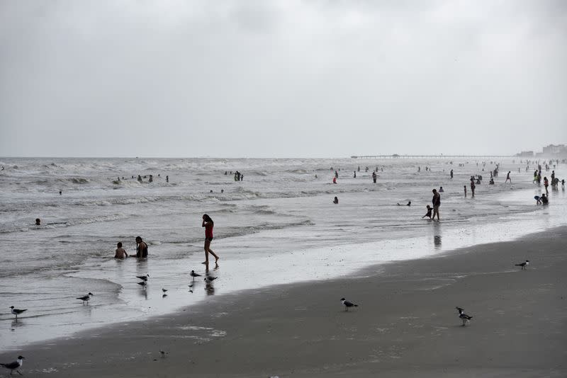 People flock to the beach after coronavirus disease (COVID-19) restrictions were lifted in time for the Memorial Day weekend in Galveston