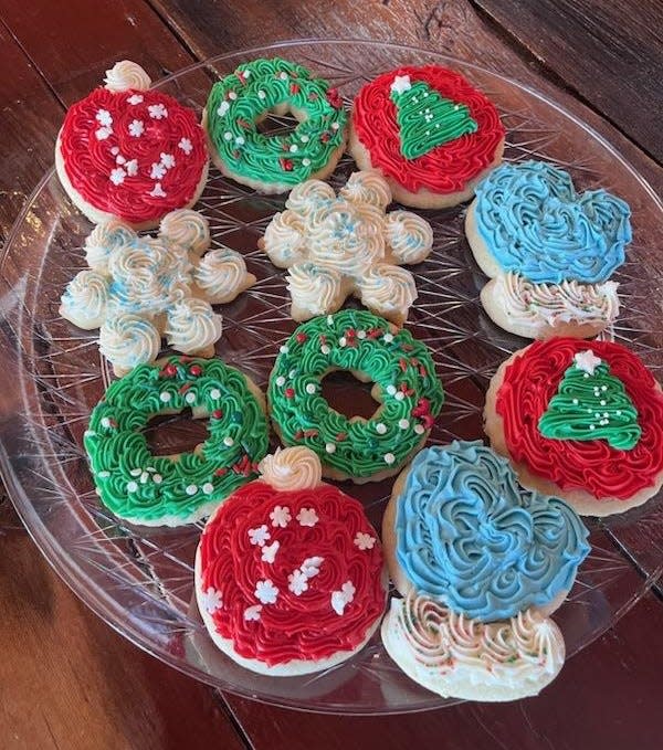 Cutout cookies available at Sweet T's Cafe in Massillon include items such as these frosted ornaments, wreaths and snowflakes.