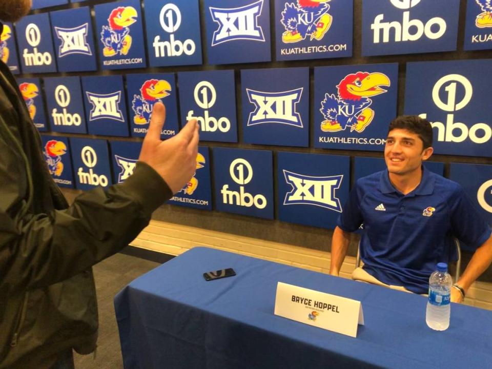 U.S. Olympian and former KU runner Bryce Hoppel talks to a reporter during a 2021 media event at Allen Fieldhouse.