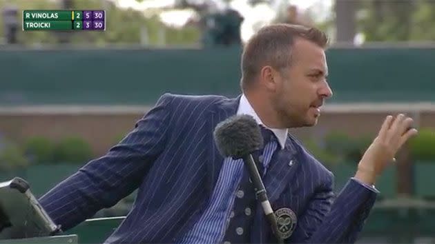 The umpire is shocked by the player's reaction. Source: Wimbledon.