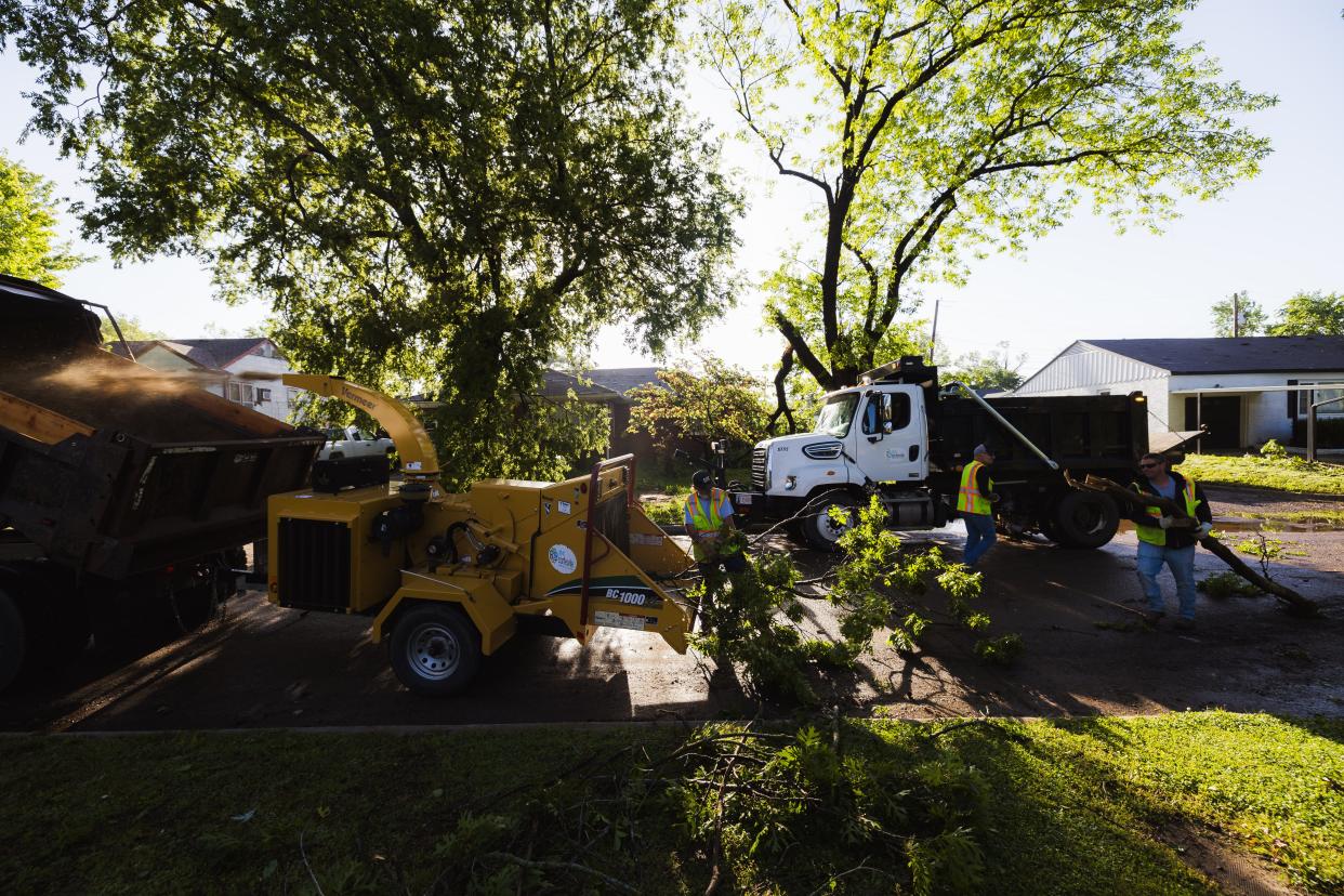 City crews work to clear down trees on the 2200 block of Osage Ave. on the southern side of Bartlesville.