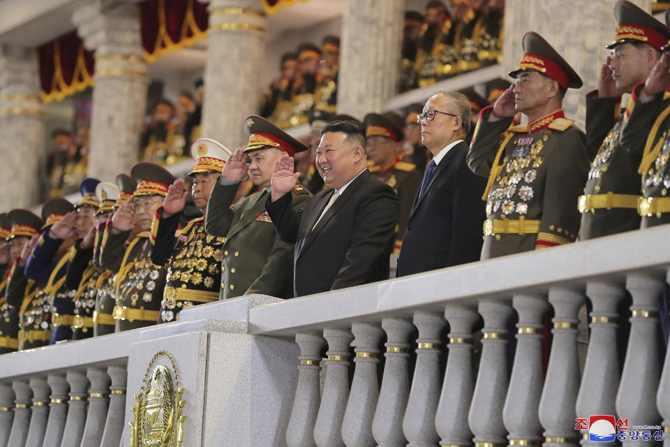 In this photo provided by the North Korean government, North Korean leader Kim Jong Un, center, Russian Defense Minister Sergei Shoigu, left to Kim, and China's Vice Chairman of the standing committee of the country’s National People’s Congress Li Hongzhong, right to Kim, attend a military parade to mark the 70th anniversary of the armistice that halted fighting in the 1950-53 Korean War, on Kim Il Sung Square in Pyongyang, North Korea Thursday, July 27, 2023. Independent journalists were not given access to cover the event depicted in this image distributed by the North Korean government. The content of this image is as provided and cannot be independently verified. Korean language watermark on image as provided by source reads: "KCNA" which is the abbreviation for Korean Central News Agency. (Korean Central News Agency/Korea News Service via AP)
